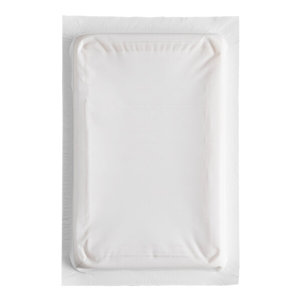 A rectangular white foam brick cold pack in sealed packaging.