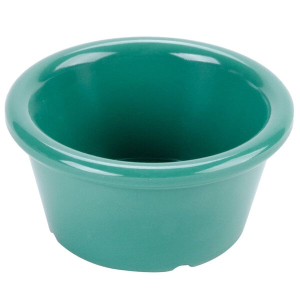 A close-up of a green GET Diamond Mardi Gras melamine ramekin.