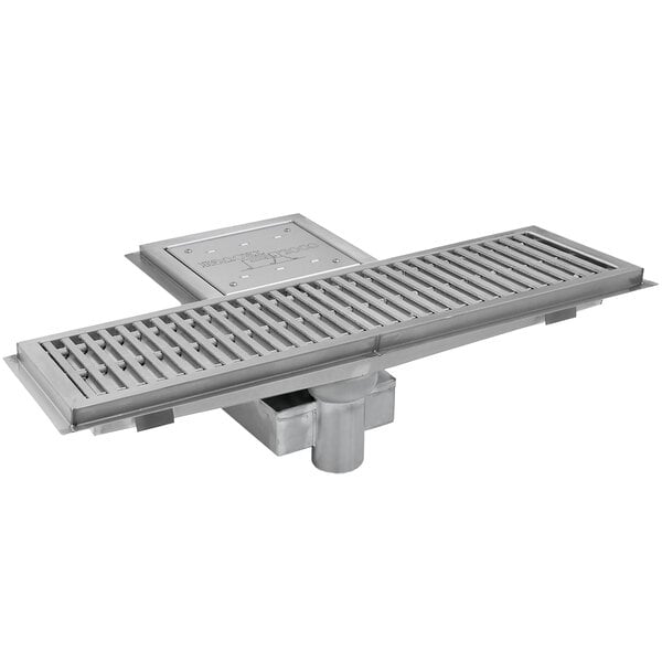 An Eagle Group Cool Trough floor drain with a fiberglass grating cover.