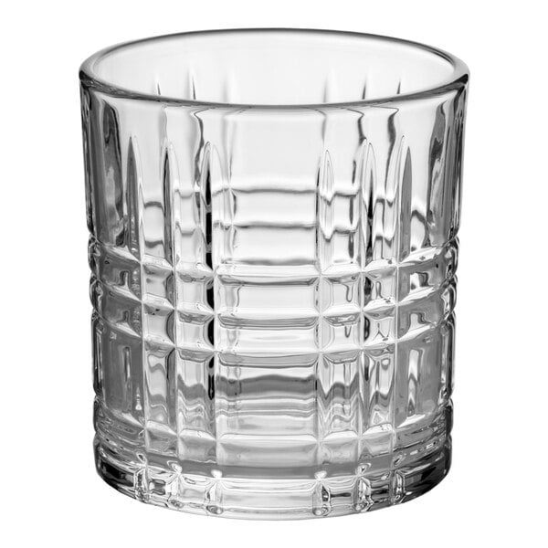 A clear glass with a textured, grid-like pattern, designed for serving rocks or old fashioned drinks.