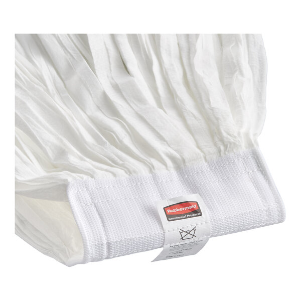 A white disposable wet mop head with a 5-inch headband.