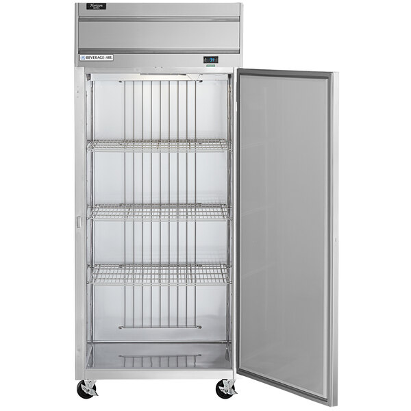 A silver Beverage-Air reach-in refrigerator with a solid door open.