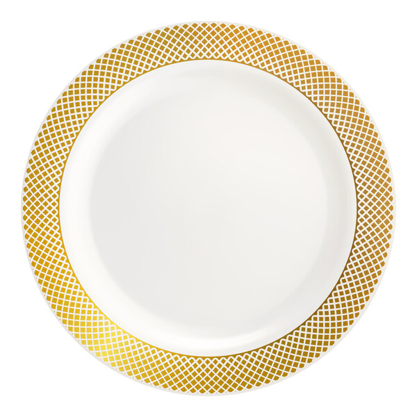 A bone or ivory plastic plate with a gold lattice design around the rim.