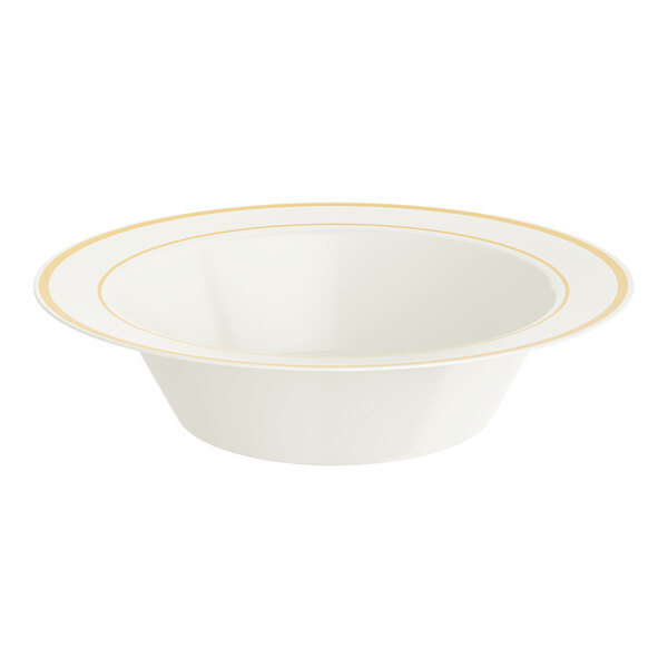 A bone or ivory plastic bowl with gold bands around the rim.