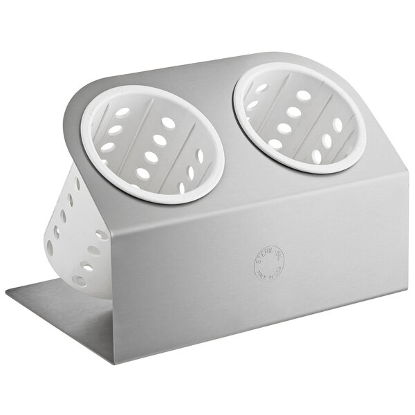 A stainless steel Steril-Sil flatware organizer with two white perforated plastic cylinders.