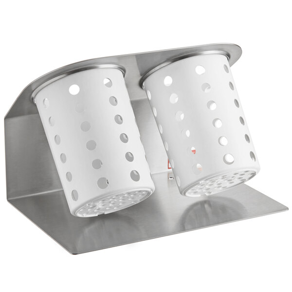 A silver Steril-Sil flatware organizer with white perforated cylinders.