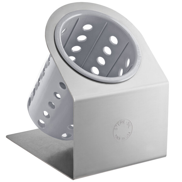 A Steril-Sil stainless steel flatware organizer with a gray perforated plastic cylinder inside.