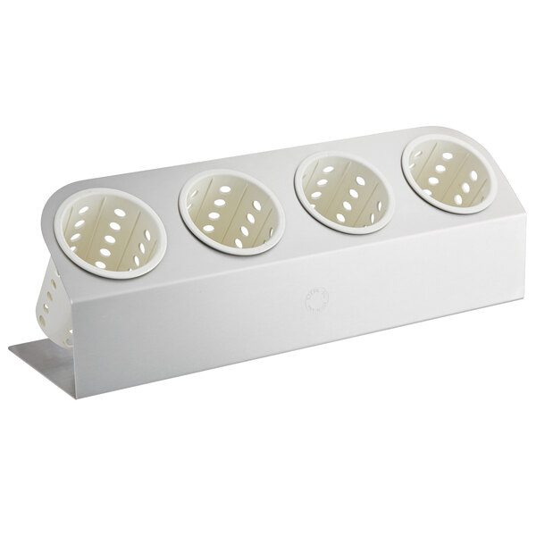 A white rectangular stainless steel flatware organizer with white perforated cylinders.