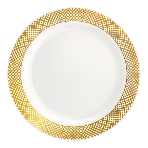 A round bone or ivory plastic plate with a gold lattice design around the rim.