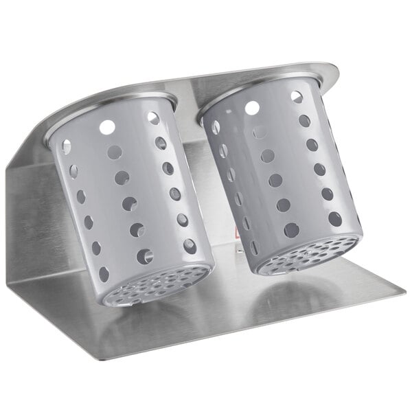 A Steril-Sil stainless steel flatware organizer with gray perforated plastic cylinders.