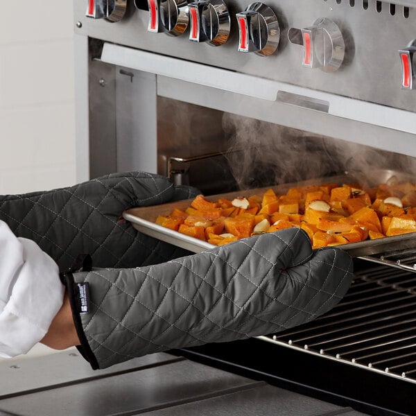 a black chair cushion with a silver tray