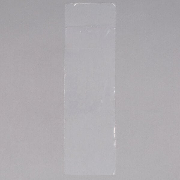 A clear rectangular plastic bag with a white label.