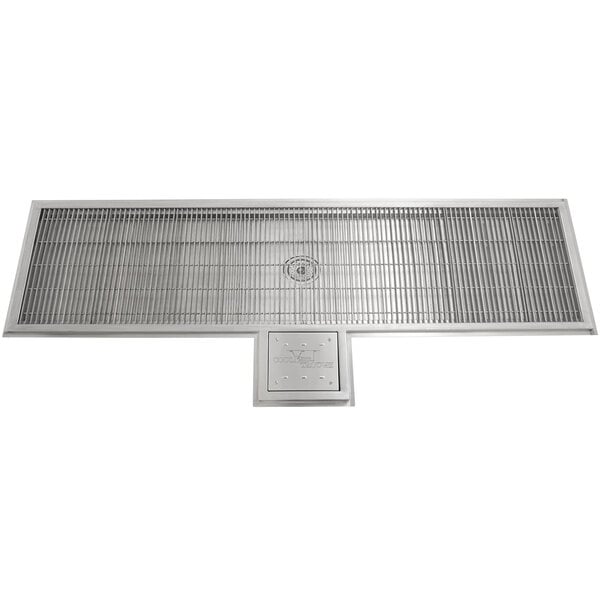 A rectangular stainless steel trough with a metal grate with square holes.