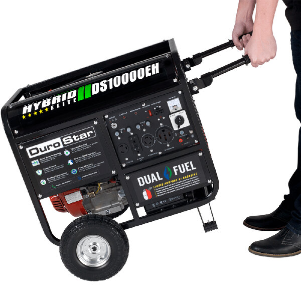 A person pushing a DuroStar portable generator.