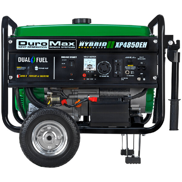 A DuroMax portable generator with a green and black cover.