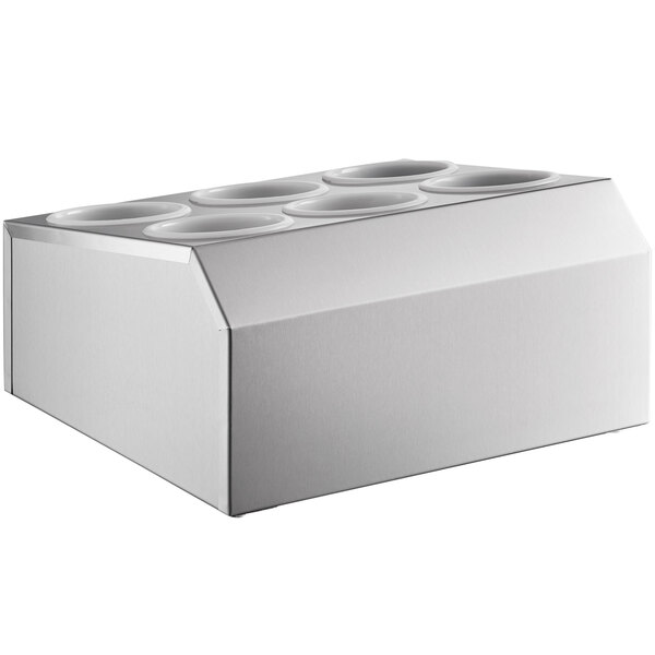 A white flatware organizer with six compartments and holes in the bottom.