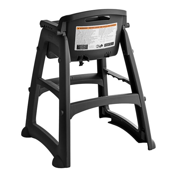 A black plastic restaurant high chair without wheels, designed for children.