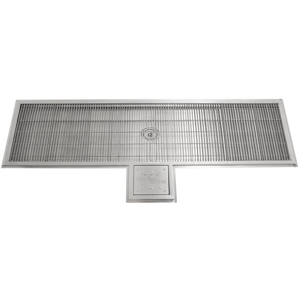 a rectangular metal grate with a square hole