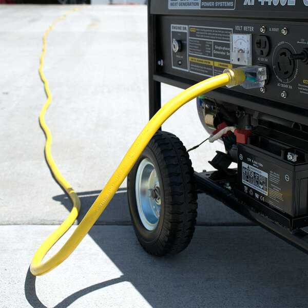 A yellow power cable connected to a power generator.