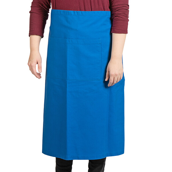 a person wearing a blue apron