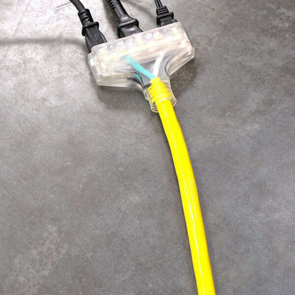 a yellow cable with a clear plastic tube