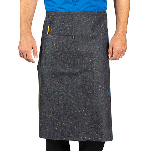 a person wearing a black apron