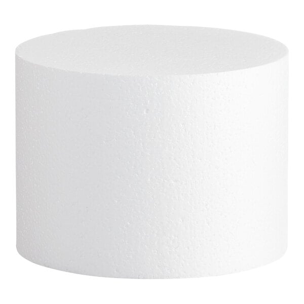 A white, cylindrical foam cake dummy measuring 8 inches by 6 inches.