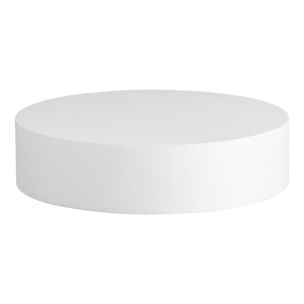 A round, white foam cake dummy measuring 16 inches in diameter and 4 inches in height.