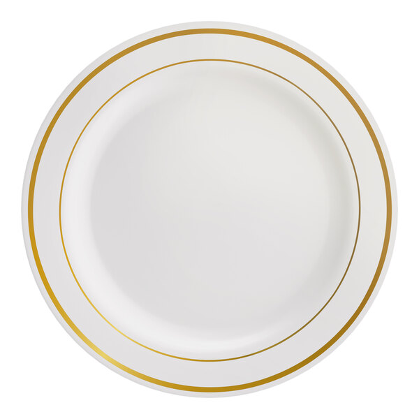 A round bone or ivory plastic plate with two gold bands near the rim.