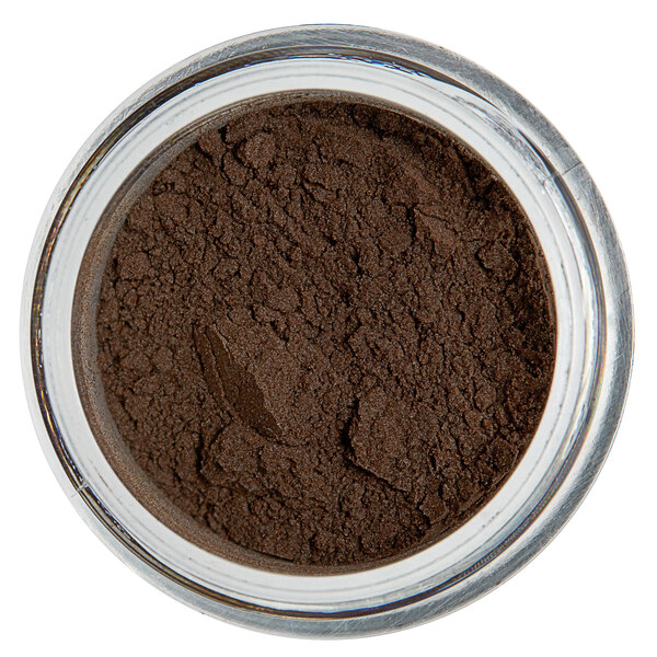 A jar of brown Roxy & Rich Forest Green Fondust powder.