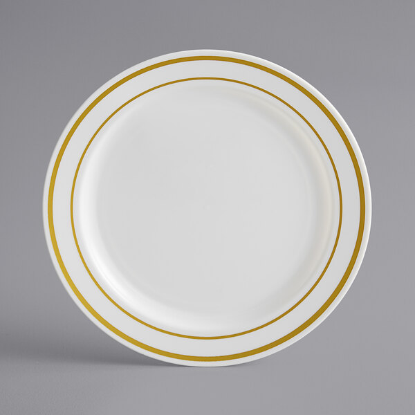 a white plate with gold rim