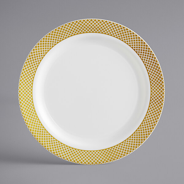 A white plate with yellow lattice design on the border.