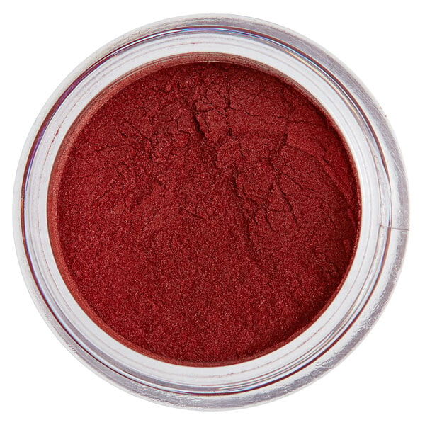 A jar of Roxy & Rich Brick Red Fondust powder.