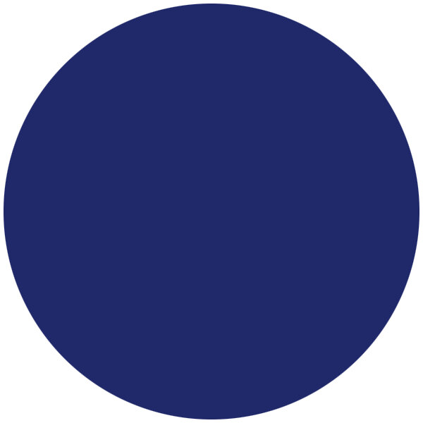 A circle of navy blue petal dust on a white background.