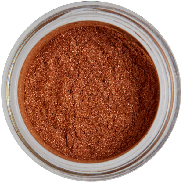 A jar of Roxy & Rich Copper Lustre Dust, a brown mineral powder.