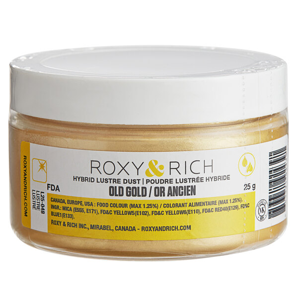 A container of Roxy & Rich Old Gold Lustre Dust on a counter.