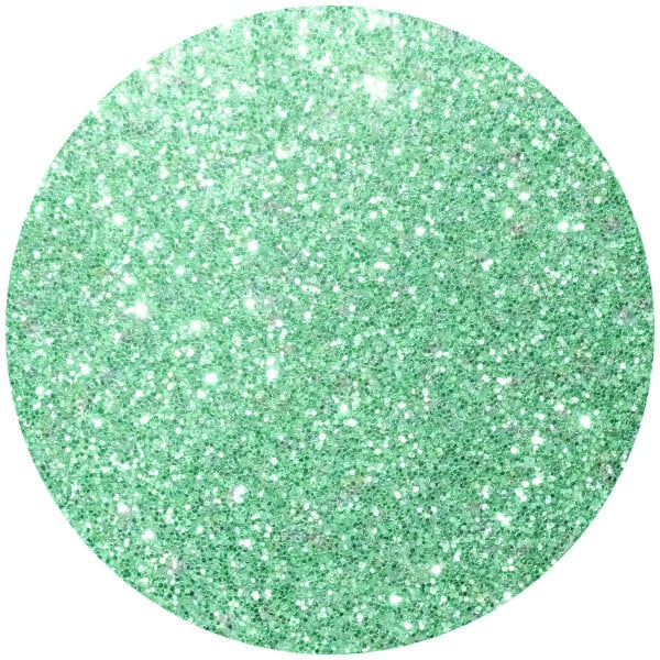 A green glitter circle on a white background.
