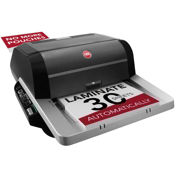 a black and silver printer with a red and white sign