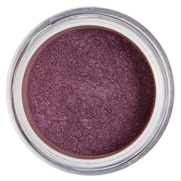 A jar of purple powder with a Roxy & Rich label.