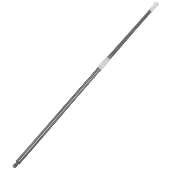 A Carlisle stainless steel broom handle with white rubber grip.