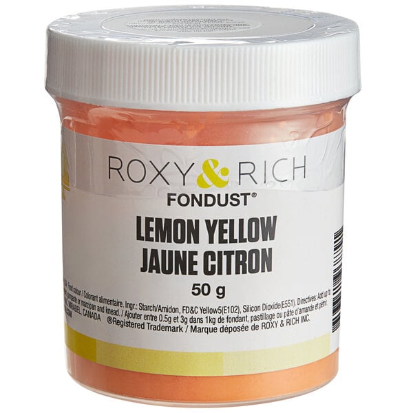A jar of Roxy & Rich Lemon Yellow Fondust, a yellow powdered food coloring.