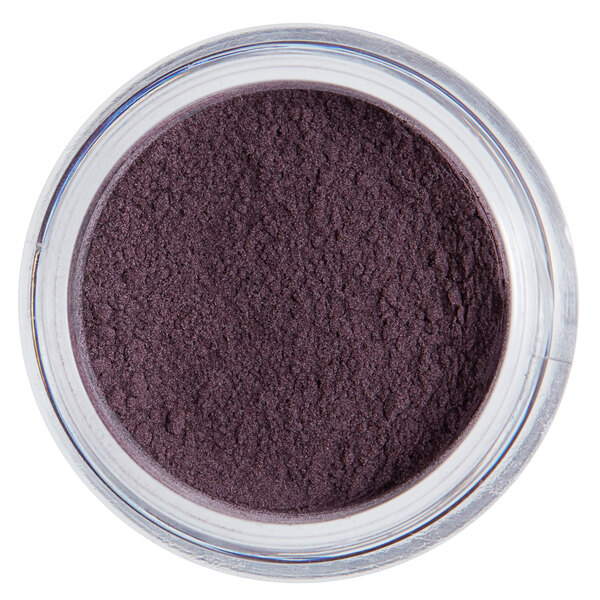 A jar of Roxy & Rich Royal Purple Fondust powder.