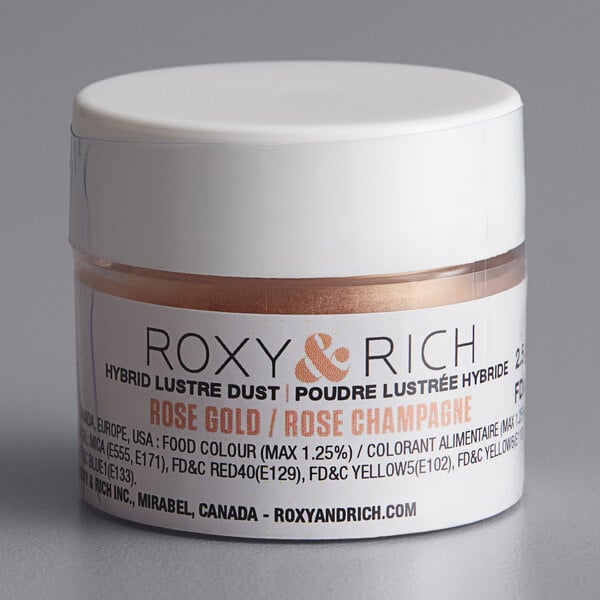 A container of Roxy & Rich Rose Gold Lustre Dust with a white lid.