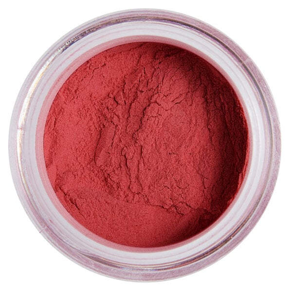 A jar of pink powder labeled "Roxy & Rich 12 Gram Pink Fondust"