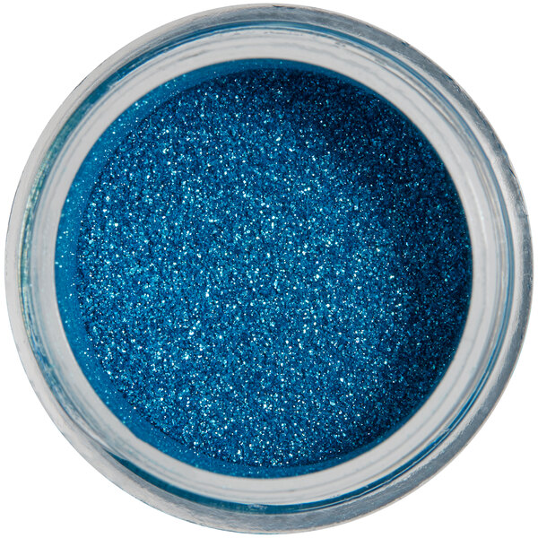 A jar of Roxy & Rich Teal Blue Sparkle Dust with blue glitter inside.