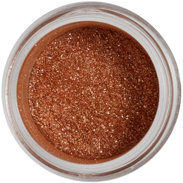 A jar of Roxy & Rich Copper Sparkle Dust with glittery powder inside.