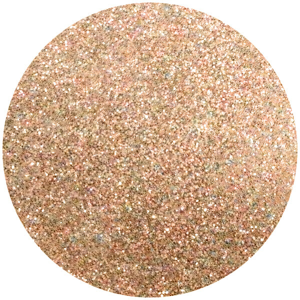 A circle of Roxy & Rich copper luster dust with a pink and gold color.