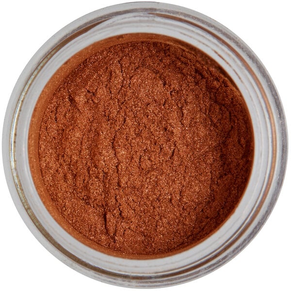 A jar of Roxy & Rich Copper Lustre Dust, brown mineral powder.