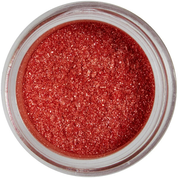 A jar of Roxy & Rich Ruby Sparkle Dust with glittery red powder inside.