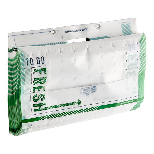 A white and green "To Go Fresh" fried chicken bag with a green and white label.